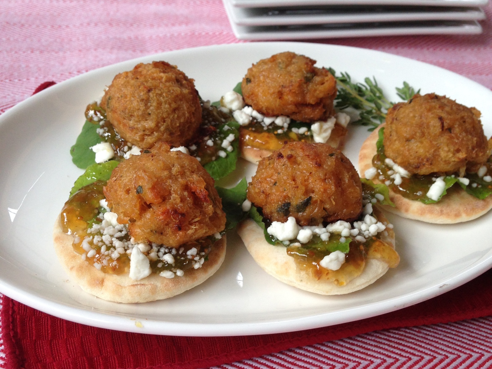 Crab Cake Mini Flatbreads Recipe featuring goat cheese, arugula and fig